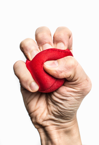 stress ball being squeezed